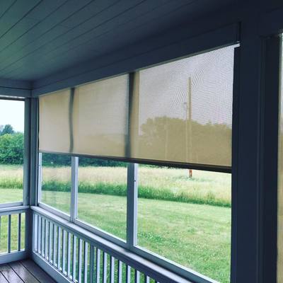 screens and shades on enclosed porch windows